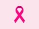 Lazo rosa, símbolo de la prevención del cáncer de mama, sobre fondo rosa claro (ilustración)